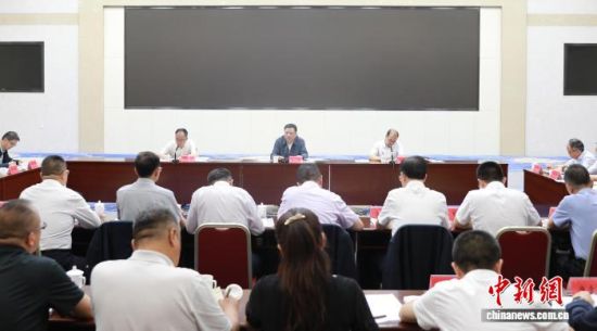 图为会议现场。胡贵龙摄